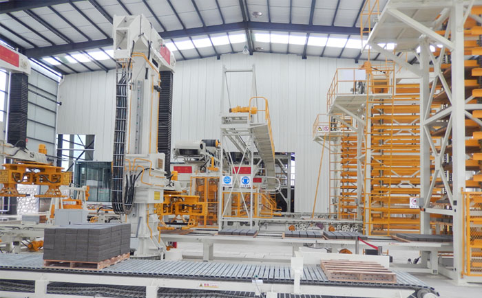 全自動雙機并列透水磚機生產(chǎn)線建廠解決方案